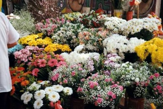 Seasonal bouquet in the foreground